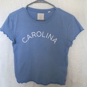 A light blue UNC Carolina tee